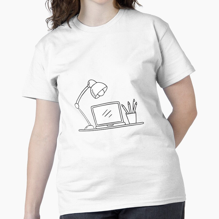 A table lamp placed next to a laptop on a study table Classic T-Shirt